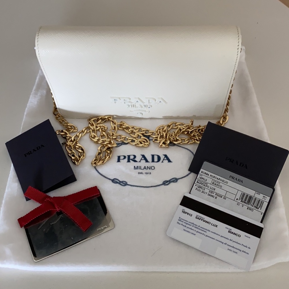SOLD! Prada saffiano crossbody with red leather